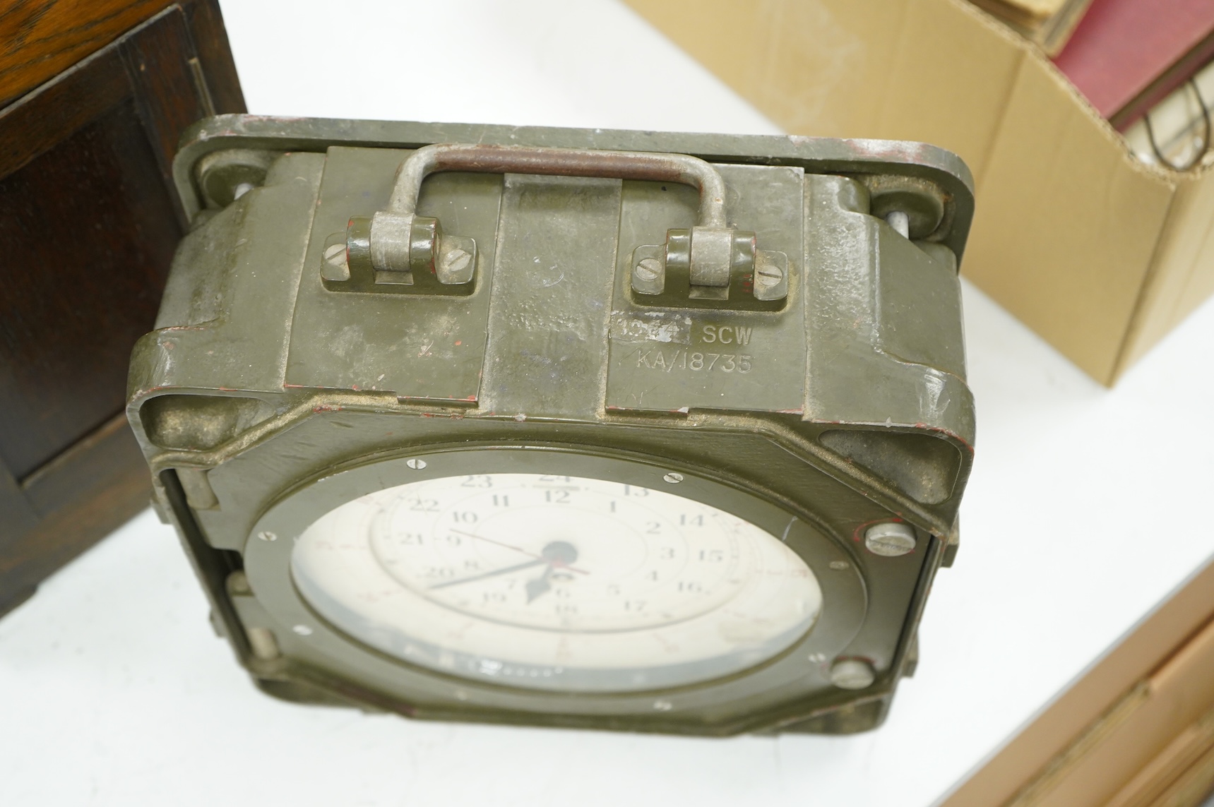 A British military Astral Smiths eight day signal clock, housed in a metal alloy case with detachable cover, 29 x 29 x 12cm